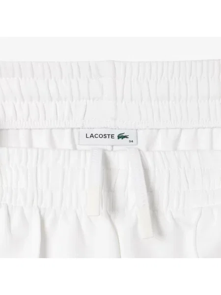 Спортивные штаны Lacoste белые