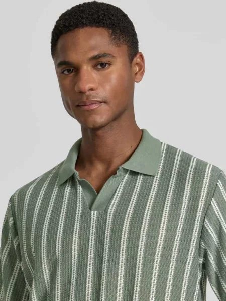 Koszulka polo o kroju regular fit z dekoltem w serek model HARRY' Jack & Jones Premium