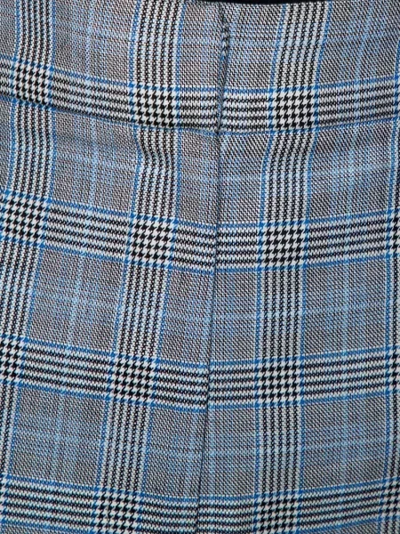 Pantaloni Tibi în carouri gri