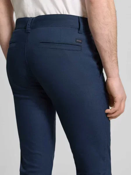 Chinosy o kroju slim fit z mieszanki bawełny lnu i z dodatkiem Boss Orange