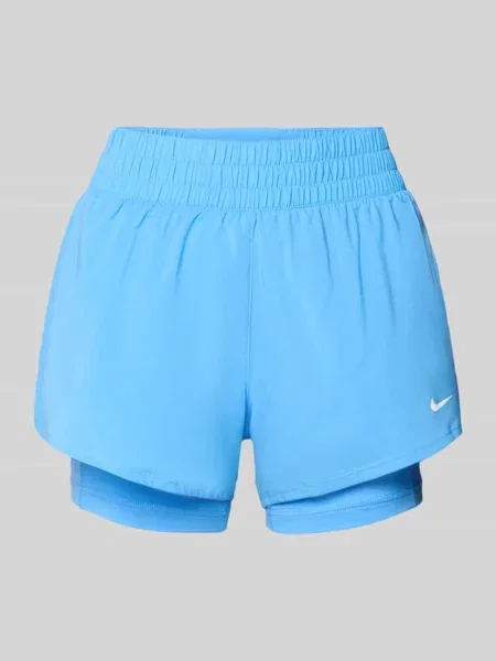 Szorty o kroju regular fit z wbudowanymi legginsami Nike Training niebieskie