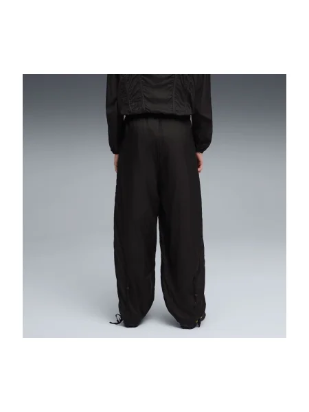 Ruhák Puma DARE TO WOVEN PANTS fekete