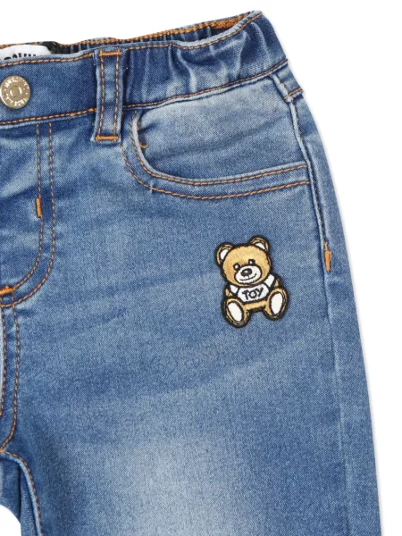 Jeansy dziecięce Moschino niebieskie