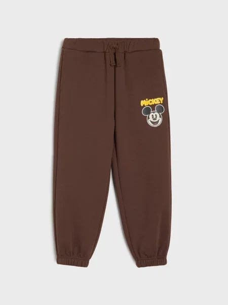 Sinsay Zateplené oversized teplákové jogger kalhoty Mickey Mouse tmavě hnědá