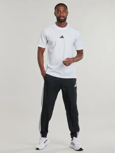 Pruhované jogger nohavice Adidas čierna