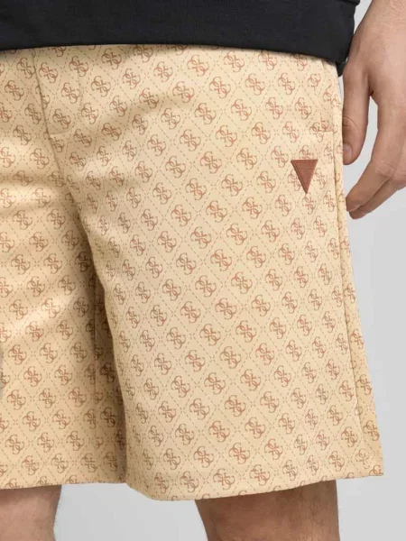 Szorty o kroju regular fit z naszywką z logo model ‘KORBIN’ Guess Activewear beżowe