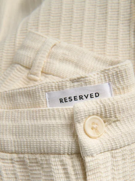 Чиносы Reserved
