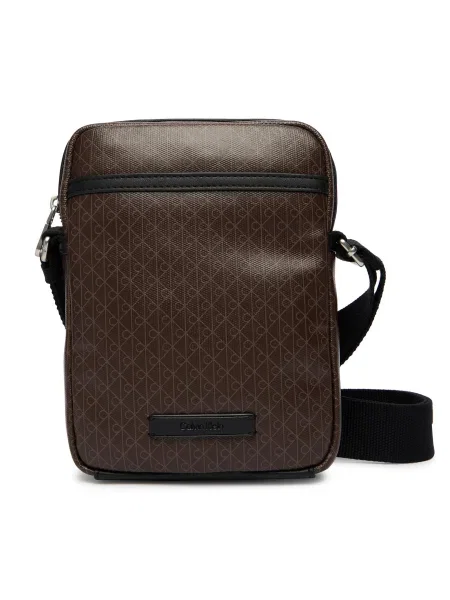 Válltáska Calvin Klein Emblem Aop Coated Slim Reporter barna