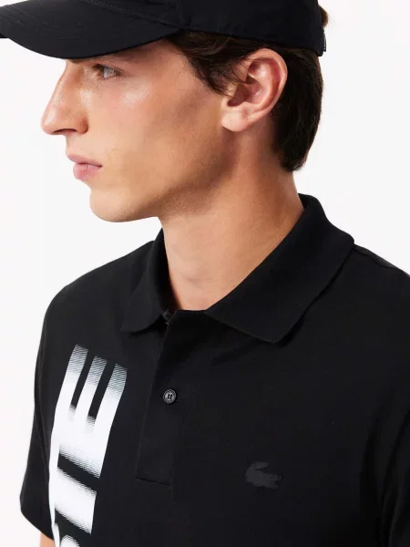 Поло Lacoste черное