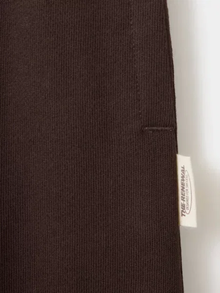Spodnie jogger o kroju barrel fit czekoladowy Dzieci 10 MANGO KIDS