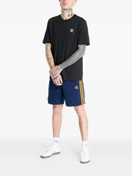 Běžecké pruhované prošívané tričko Adidas oranžové