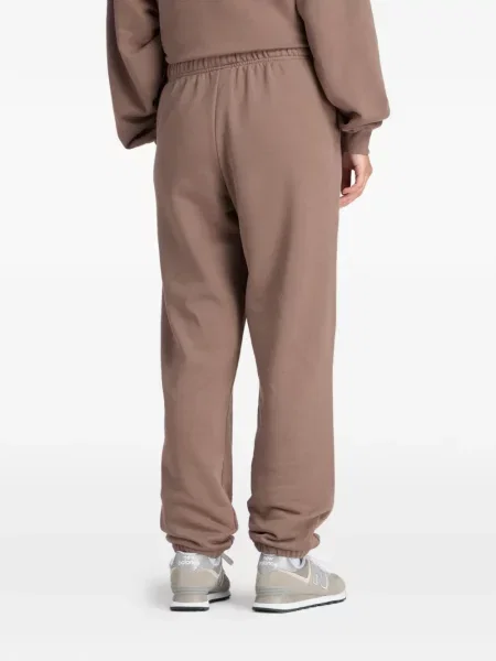 Pantaloni New Balance alergare cu autograf cu dungi roz