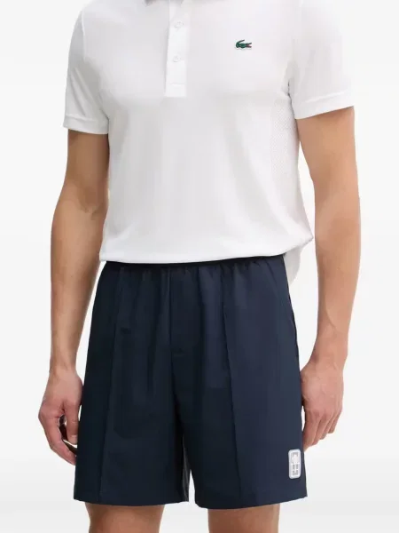 Pantaloni scurți Lacoste cu autograf albastru