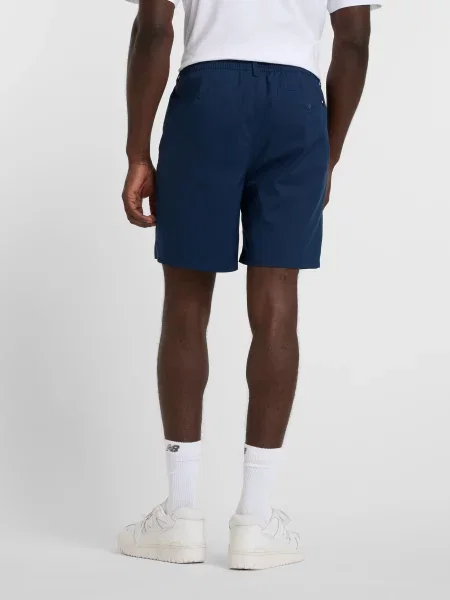 Повседневные короткие шорты New Balance синие