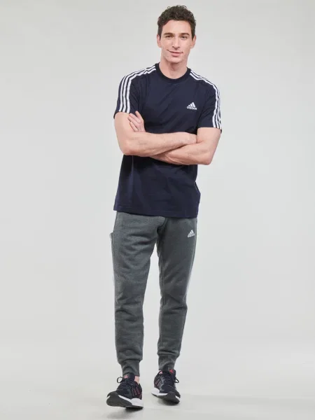 Csíkos frottír melegítőnadrág Adidas szürke