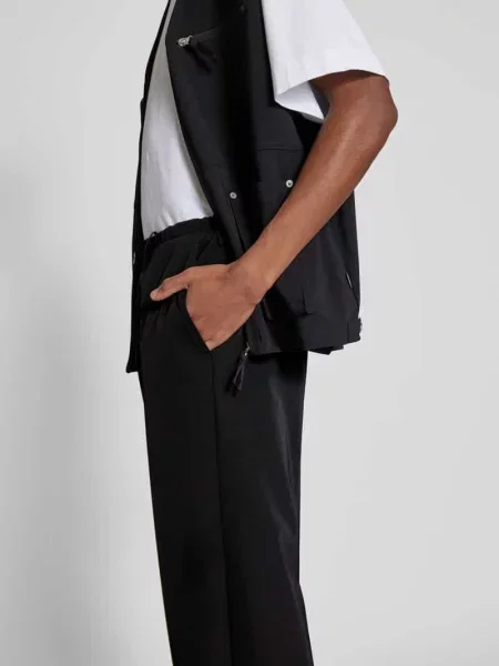 Spodnie o kroju regular fit z zapięciem na guzik Mm6 Maison Margiela czarne