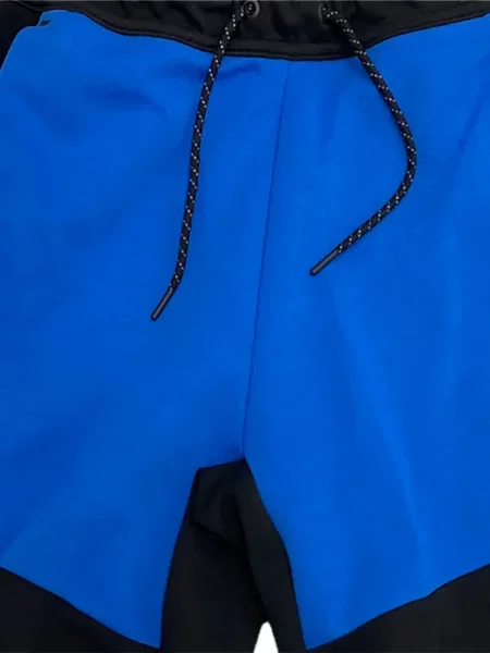 Pantaloni Nike din fleece alergare cu broderie negru