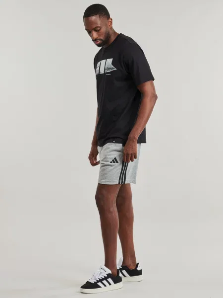 Pruhované froté kraťasy Adidas černé