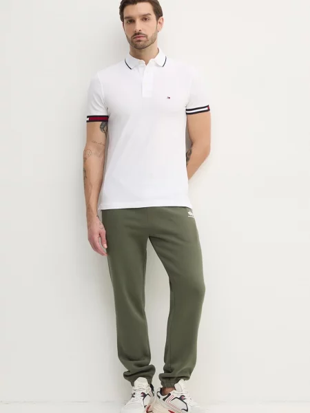 Спортивні штани Alpha Industries з аплікацією зелений