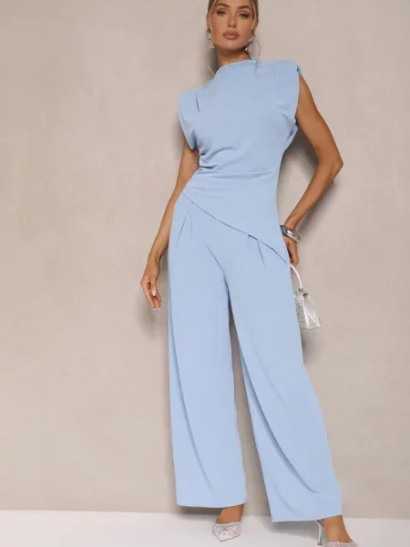 Jasnoniebieski Komplet Bluzka z Poduszkami w Ramionach i Proste Spodnie z Gumką w Pasie Divanes niebieska