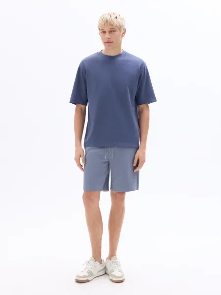 Pantaloni sport Celio albastru