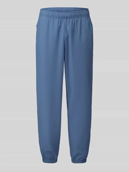 Spodnie dresowe o kroju regular fit z nadruk z logo model FORM' Nike Training niebieskie