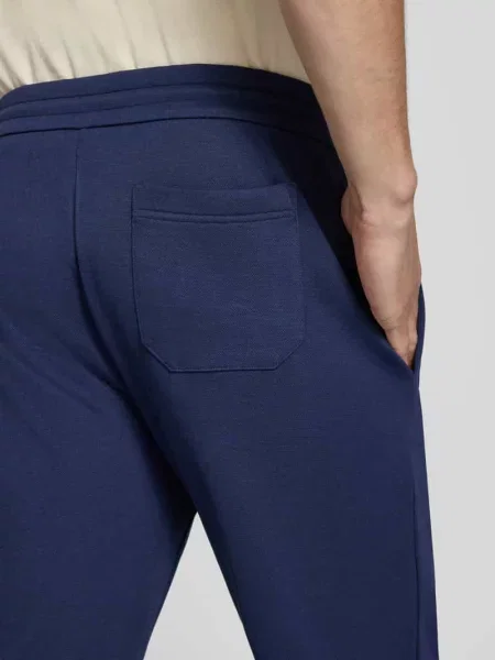 Spodnie dresowe o luźnym kroju z wyhaftowanym logo model MESH FACE' Polo Ralph Lauren granatowe