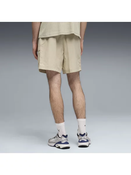 PUMA bojówki o luźnym kroju WARDROBE ESS 6" Odzież S beżowy