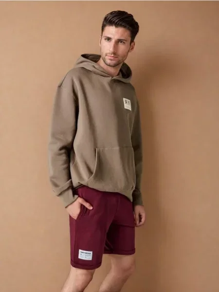 Sinsay Teplákové kraťasy kaštanová