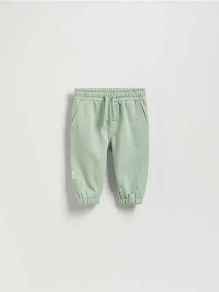 Reserved Pantaloni din verde-deschis verde