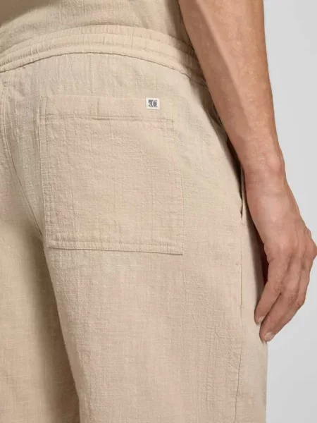 Szorty materiałowe o kroju relaxed fit z czystej bawełny S.oliver Red Label beżowe