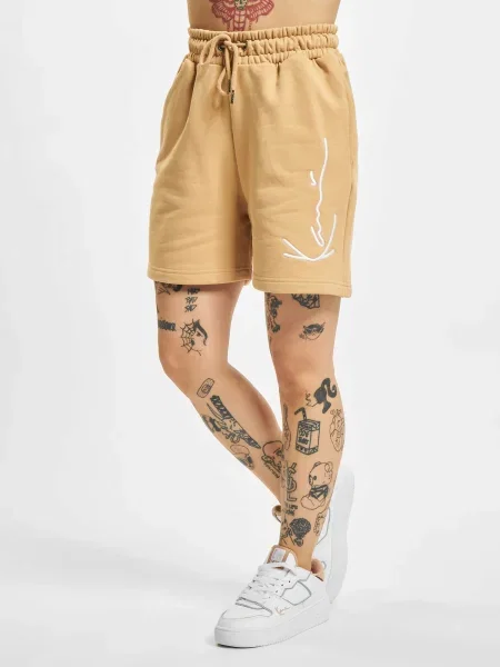 Karl Kani Pantaloni bej deschis alb