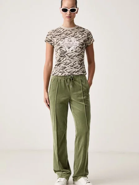 Juicy Couture штани flare велюрові TINA TRACK PANT