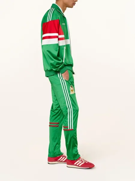 Sportovní kalhoty Adidas zelený