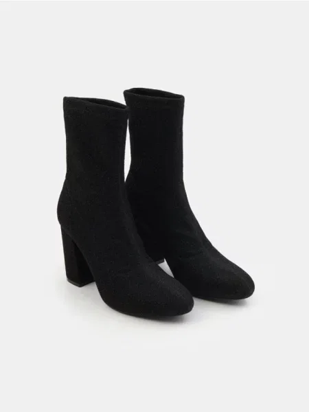 Високі черевики на чорний