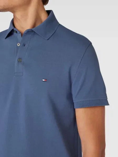 Koszulka polo o kroju slim fit model Tommy Hilfiger niebieskie