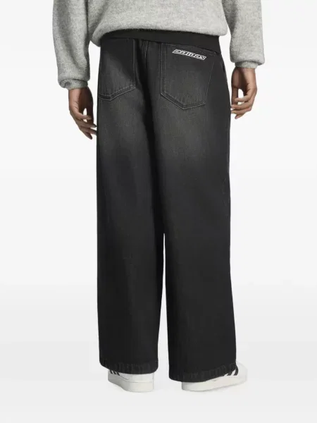 Siuvinėtos plačių klešnių džinsai Adidas juoda