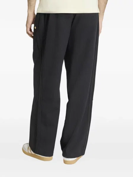 Blugi Adidas cu imagine cu dungi negru