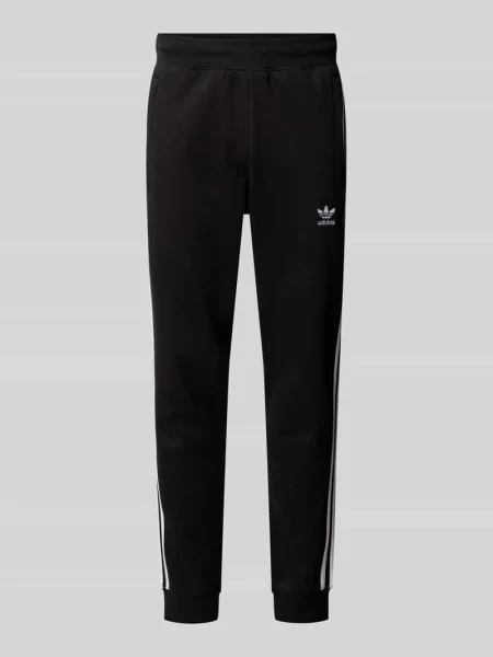 Spodnie dresowe o kroju regular fit z wyhaftowanym logo model Adidas Originals czarny
