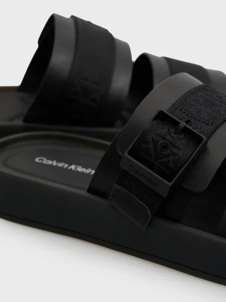 Шлепанцы Calvin Klein с пряжкой черные