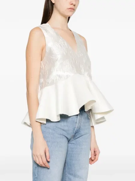Cu peplum top Ganni din satin alb