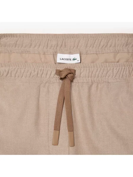 Lacoste Wide Fit Spodnie beżowe