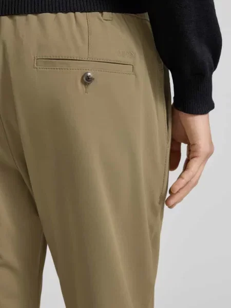 Spodnie materiałowe o kroju slim fit z elastycznym pasem Mcneal