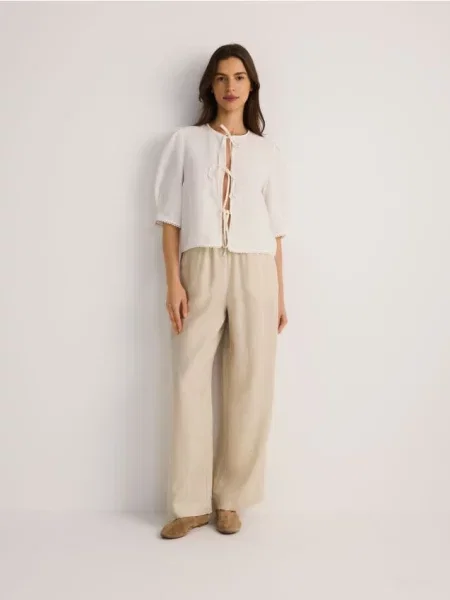 Reserved Широкі лляні штани бежевий