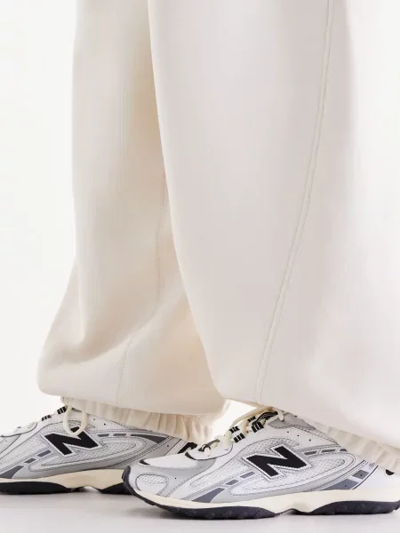 Флисовые спортивные штаны New Balance белые