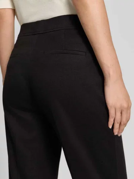Spodnie materiałowe o kroju bootcut z dodatkiem Christian Berg Woman czarne