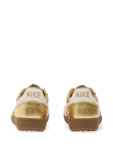 Sneakerși Nike auriu