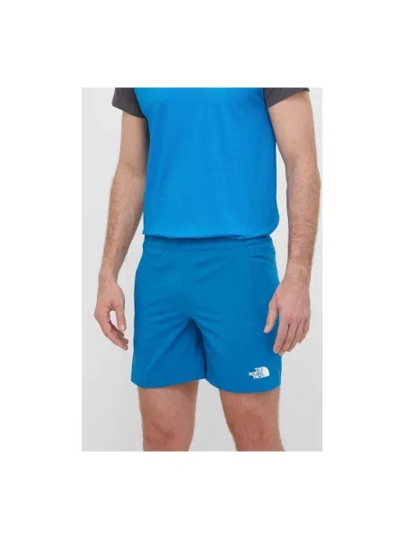 Pantaloni The North Face albastru
