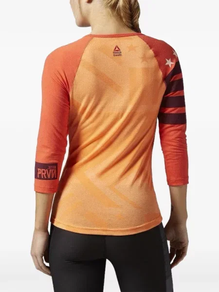 Ριγέ μπλούζα Reebok με λαιμόκοψη v πορτοκαλί
