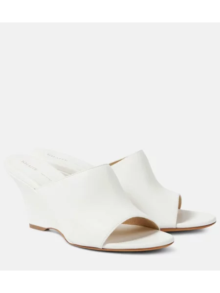 Usnjene mules Khaite s polno peto bela